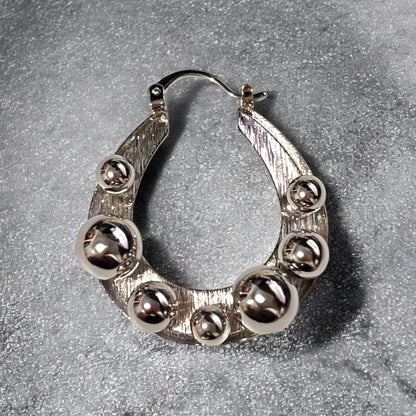 Aretes Nova